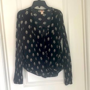 2/25$ Mossimo printed top with tie top front